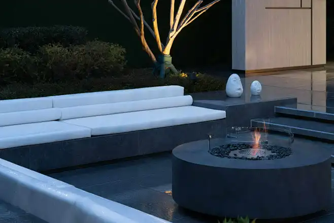 round-shaped concrete fire pit